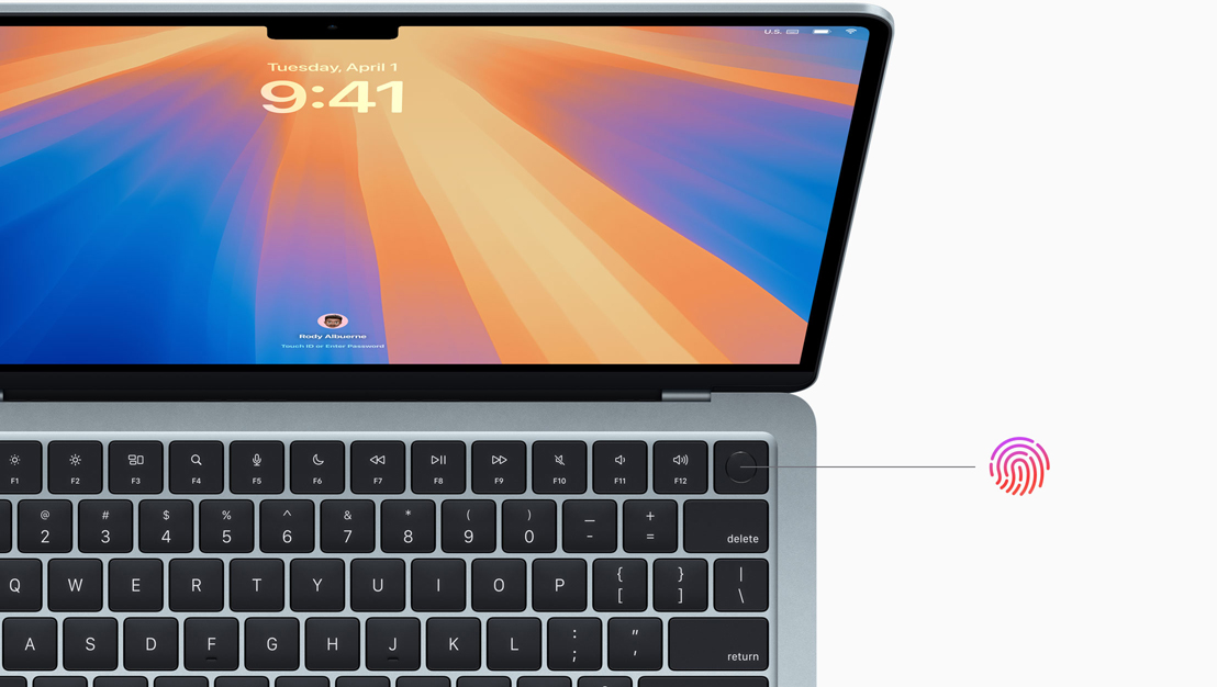 Una MacBook Air en azul cielo abierta que muestra la ubicación del botón de Touch ID.