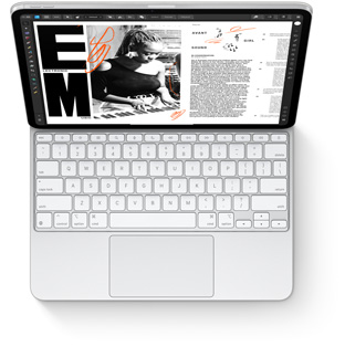 俯視 iPad Pro 及適用於 iPad Pro 的白色精妙鍵盤。